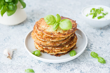 Potato pancakes with herbs and sour cream, Russian, Belarusian cuisine, selective