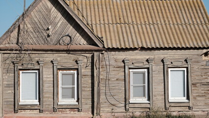 Obraz premium Details and elements of the facade of the building. Russian architecture, background image for web design.