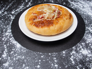 pizza bread on a white plate