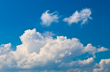 Naklejka na ściany i meble fluffy white clouds and blue sky