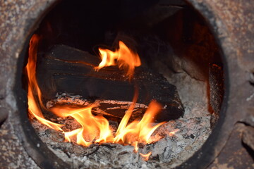 burning firewood in the stove