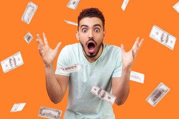 Oh my god, wow! Portrait of amazed man looking at camera with big eyes and open mouth, absolutely...