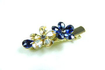 hairpin isolated white background   inlaid with rhinestones blue and gold flowers