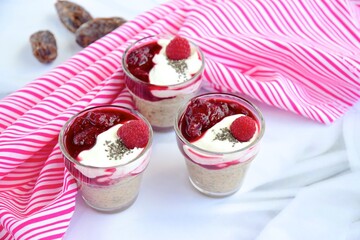 Chia date pudding with yogurt and raspberry sauce