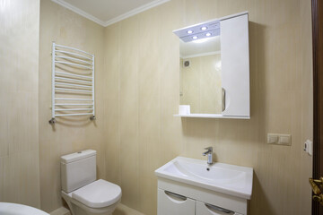 Fototapeta na wymiar Modern bathroom with jacuzzi bath, apartment comfort,luxury spa,