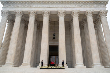 Washington, DC, USA / 9/24/2020: Justice Ruth Bader Ginsburg's casket draped in an American flag on...