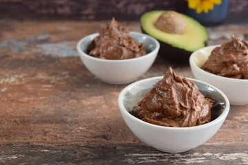 Raw chocolate avocado pudding or mousse