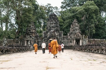 Buddhist monks in Angkor wat temple complex in Cambodia, Siem Reap Buddhist temple