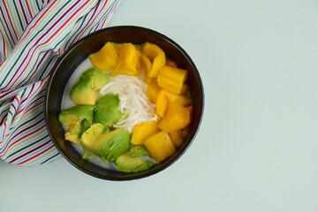 Es Teler, Indonesian cuisine, dessert from jackfruit, avocado, coconut meat, coconut milk on crushed ice