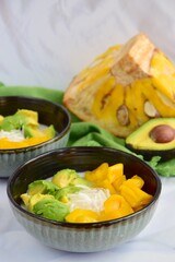 Es Teler, Indonesian cuisine, dessert from jackfruit, avocado, coconut meat, coconut milk on crushed ice