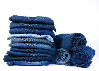 jeans stacked isolated on white background. - 386134842