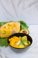 Es Teler, Indonesian cuisine, dessert from jackfruit, avocado, coconut meat, coconut milk on crushed ice