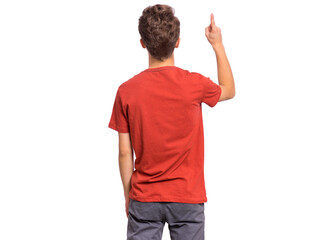 Handsome teen boy with his back turned to camera, pointing to something, isolated on white...