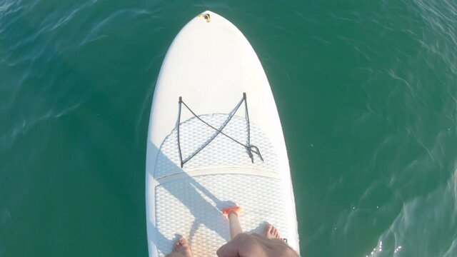 Elevated view of standup paddle board on water