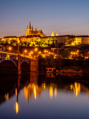 Fototapeta na wymiar Prague castle across the Vltava river in the evening light