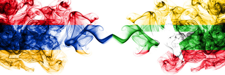 Armenia vs Myanmar, Burmese smoky mystic flags placed side by side. Thick colored silky abstract...