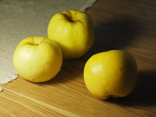 Three fresh apples on the table