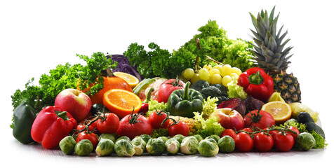 Composition with fresh vegetables and fruits isolated on white