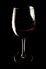 Banner glasses with red wine on black background vinotheque, copy space