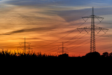 Fototapeta premium electricity transportation with hgh voltage wire on pylon