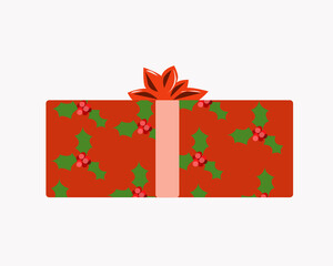 Gift box red with a bow and leaves and berries