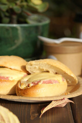 Sandwich with ham and cheese on white bread