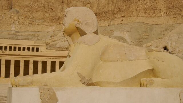 Egyptian sculpture at the entrance to the Funerary Temple of Hatshepsut in Luxor, Egypt