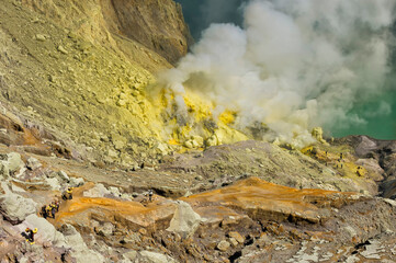 Sulphur carriers climbing out of Kawah Ijen volcano (Ijen crater), Banyuwangi, East Java, Indonesia, Asia