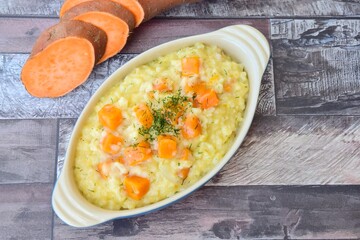 Homemade risotto with sweet potato and dill