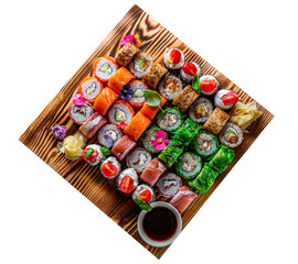 set of sushi roll with salmon, avocado, cream cheese, cucumber, rice, caviar, eel, tuna in wooden plate isolated on white background