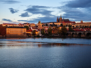 View on Prague Castle and Charles Bridge in the morning light on an autumn morning