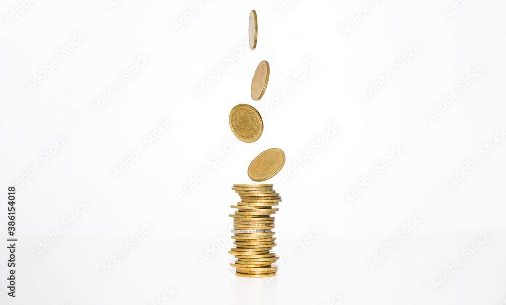 Wall mural business financial money saving concept. coin falling down with coin stacking on white background. f