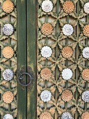 Wooden door with old floral decorative pattern in Korean traditional temple