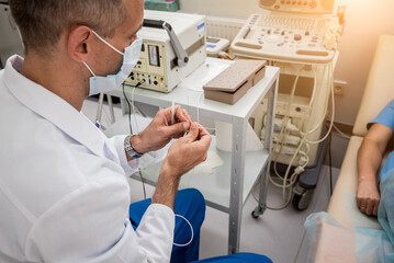 Cardiologist use tubes for radiofrequency catheter ablation.