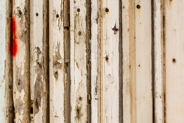 Background texture of old white painted wooden lining boards wall