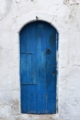 blue metal door in north african city