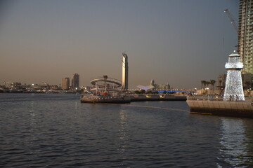 Dubai slyline from Dubai Creek Harbour and Dubai canal to Downtown and Business Bay, United Arab Emirates