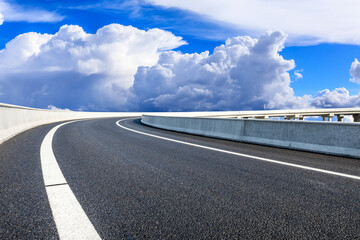 New asphalt road and mountain with sky cloud natural scenery.