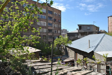 
yerevan city armenia excursion travel totev temple stonehenge journey walk tour city suburb village road path people mountains slopes rocks road walls path nature temples ancient buildings