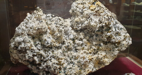 Huge rock crystal consisting of arsenic, copper gravel and pyrit