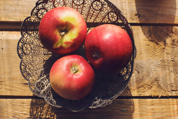 Cozy morning autumn composition fresh organic apples in vintage vase