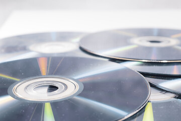 CD' DVD on white background. Pile of DVD compact disks