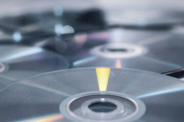 CD' DVD on white background. Pile of DVD compact disks