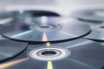 CD' DVD on white background. Pile of DVD compact disks