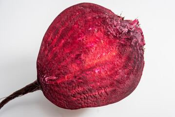 Macro background of beetroot sliced on white background