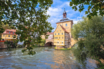 Fototapeta premium Bamberg. Scenic view of Old Town Hall of Bamberg (Altes Rathaus) with two bridges over the Regnitz river