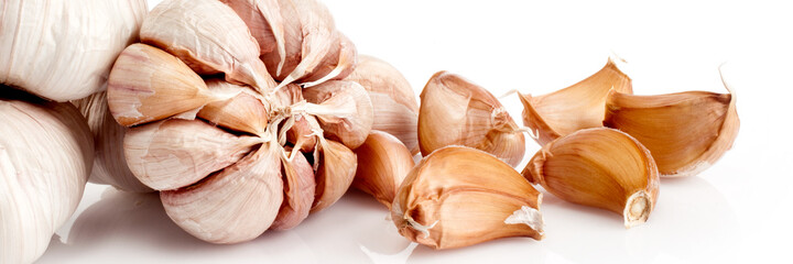 Food banner concept, organic vegetables and ingredients: close up of organic garlic
