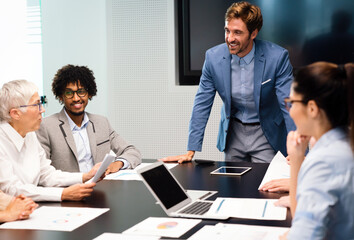 Portrait of successful business team working in office