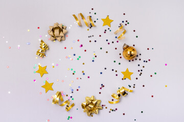 Gold and Silver Confetti in Shape of Stars on Blue Background Sparkly Background Holiday Celebration Concept Festive Background New Year