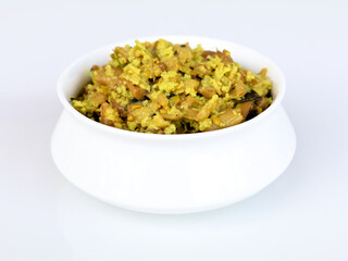 Perum koon or Kerala mushroom curry prepared with bird eye chili and curry leaves
